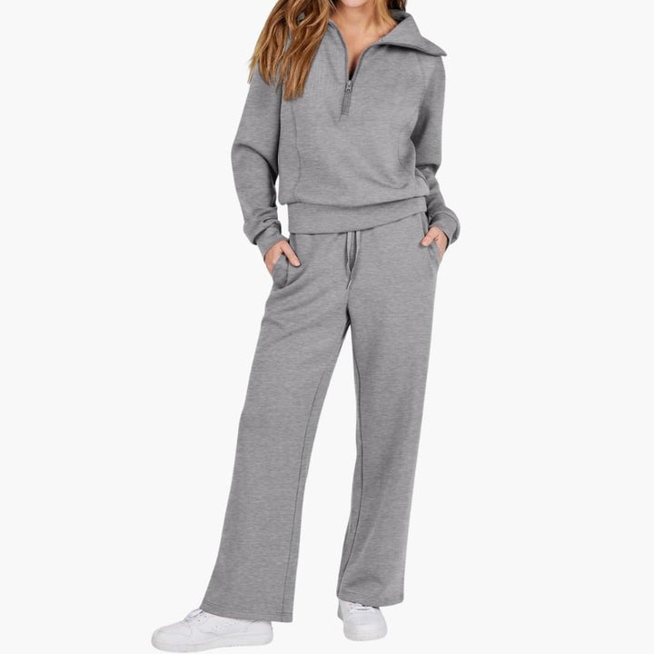 Women's half zip wide leg lounge set in navy side view showing wide leg silhouette