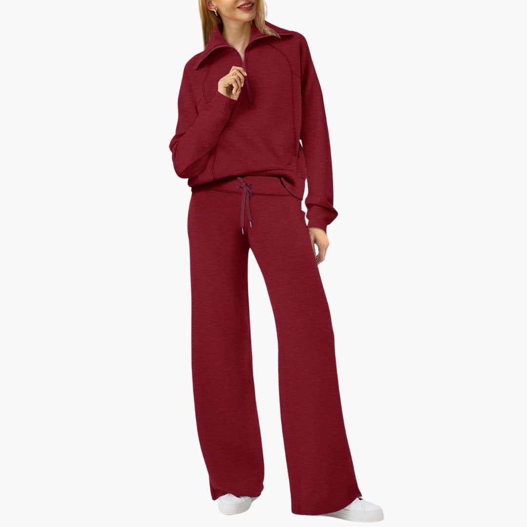 Women's half zip wide leg lounge set in black styled with sneakers