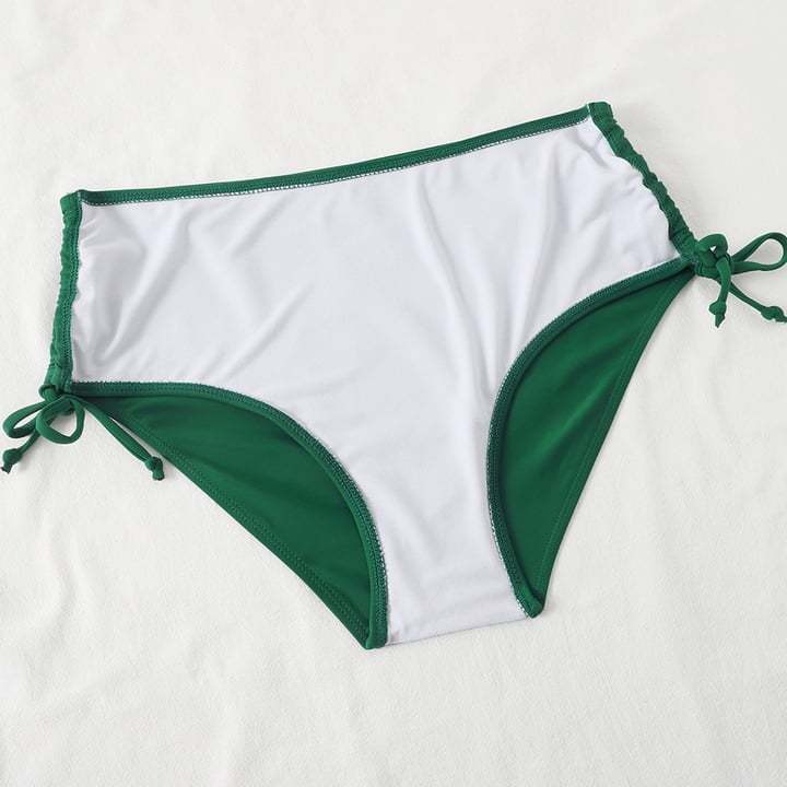Close-up of bikini top removable cups and adjustable shoulder strap hardware detail