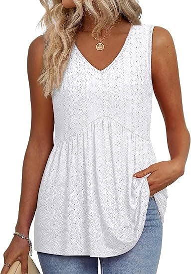 Front view of a lightweight sleeveless top with a soft drape, shown in a light pink colorway