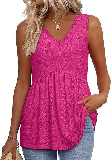 Sleeveless casual top in blue floral print styled with jeans for a fresh spring outfit