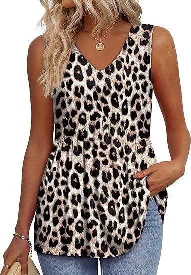 Group of sleeveless casual tops displayed in multiple colors including black, pink red, and blue floral