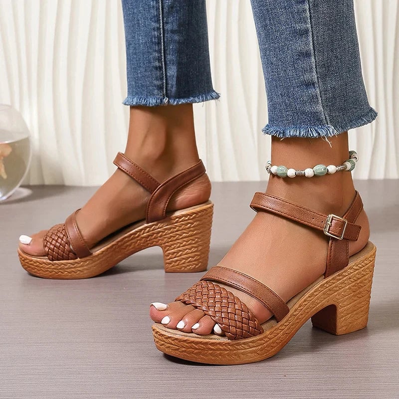 White woven platform sandals flat lay on a light surface