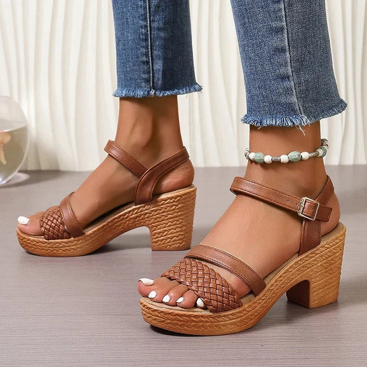 White woven platform sandals flat lay on a light surface