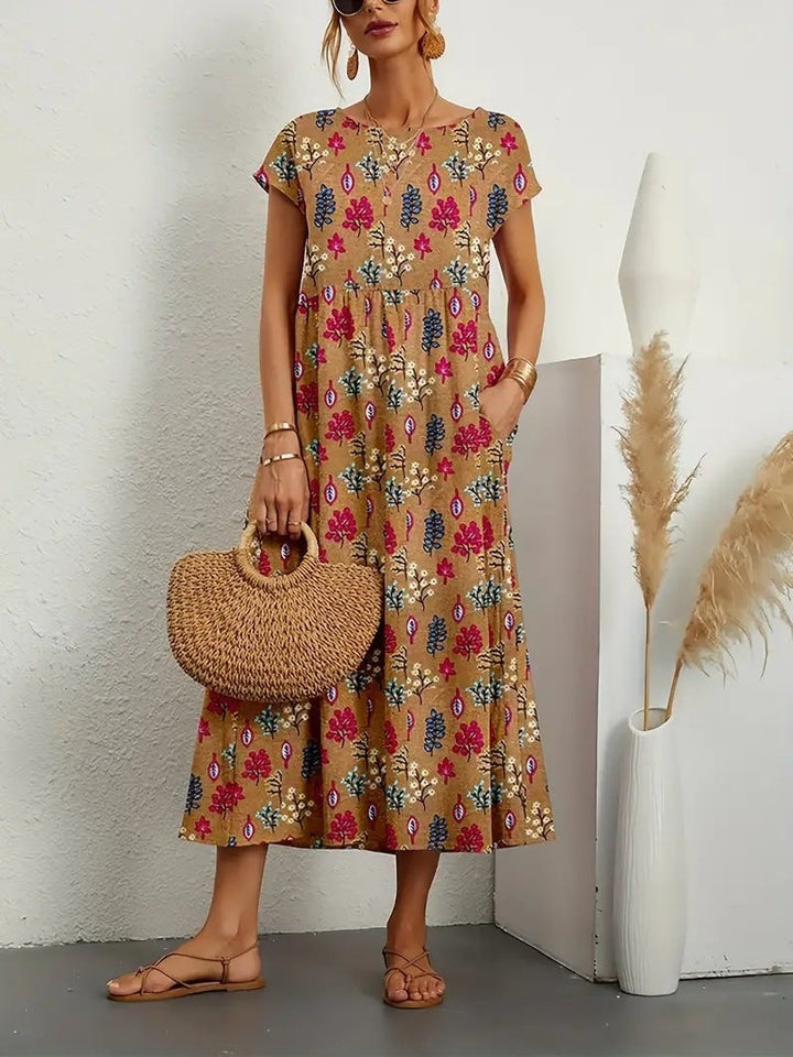 Full-length view of elegant floral dress with side pockets, styled casually for a summer day look