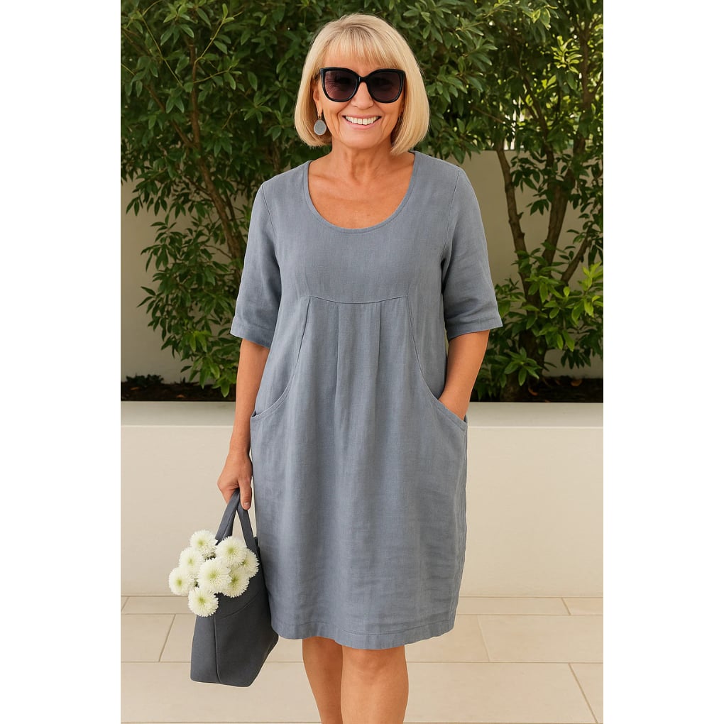 Full-length view of the Deborah summer dress in navy showing relaxed fit and length