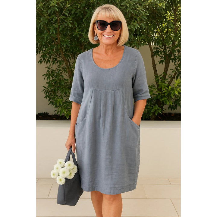 Full-length view of the Deborah summer dress in navy showing relaxed fit and length