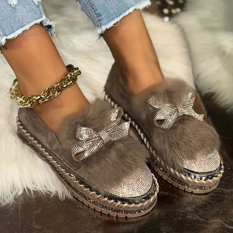 Women's crystal bow platform loafers in silver and brown colorways side by side