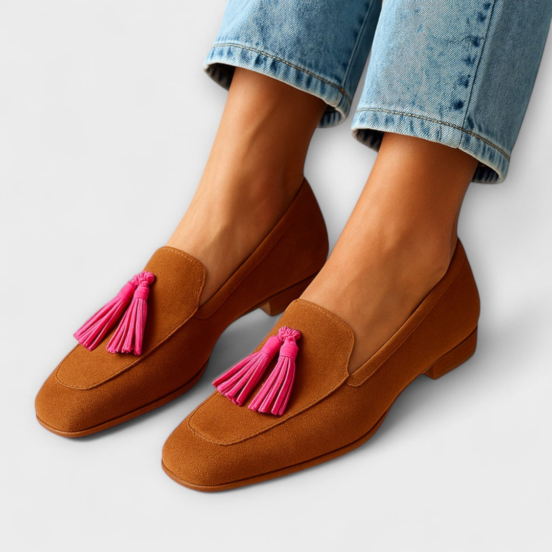 Delphine women's brown slip-on loafers with cushioned sole, shown from a three-quarter angle