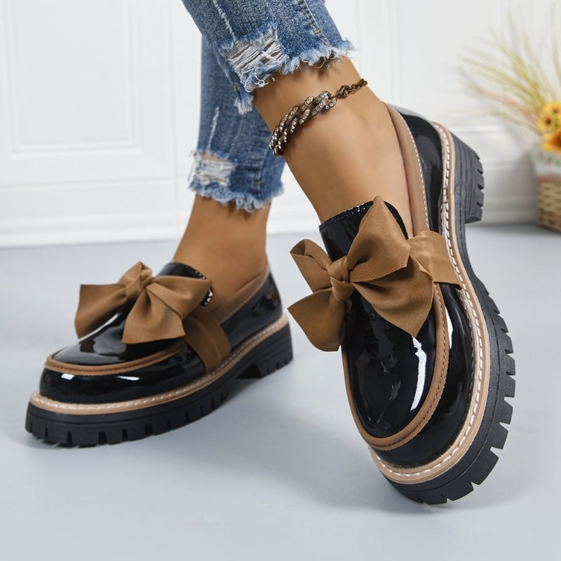 Demi bow platform loafers in all five colors — beige, green, black, brown, and burgundy — arranged together
