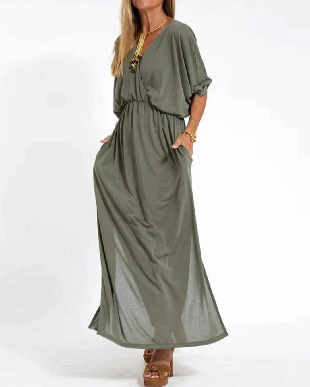 Model wearing the Denise long maxi dress in a flowing silhouette, styled for a summer day