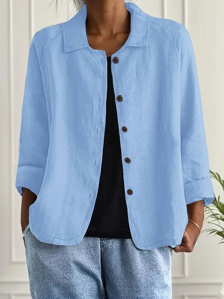 Model wearing a classic lightweight layering top in light blue, styled with casual bottoms