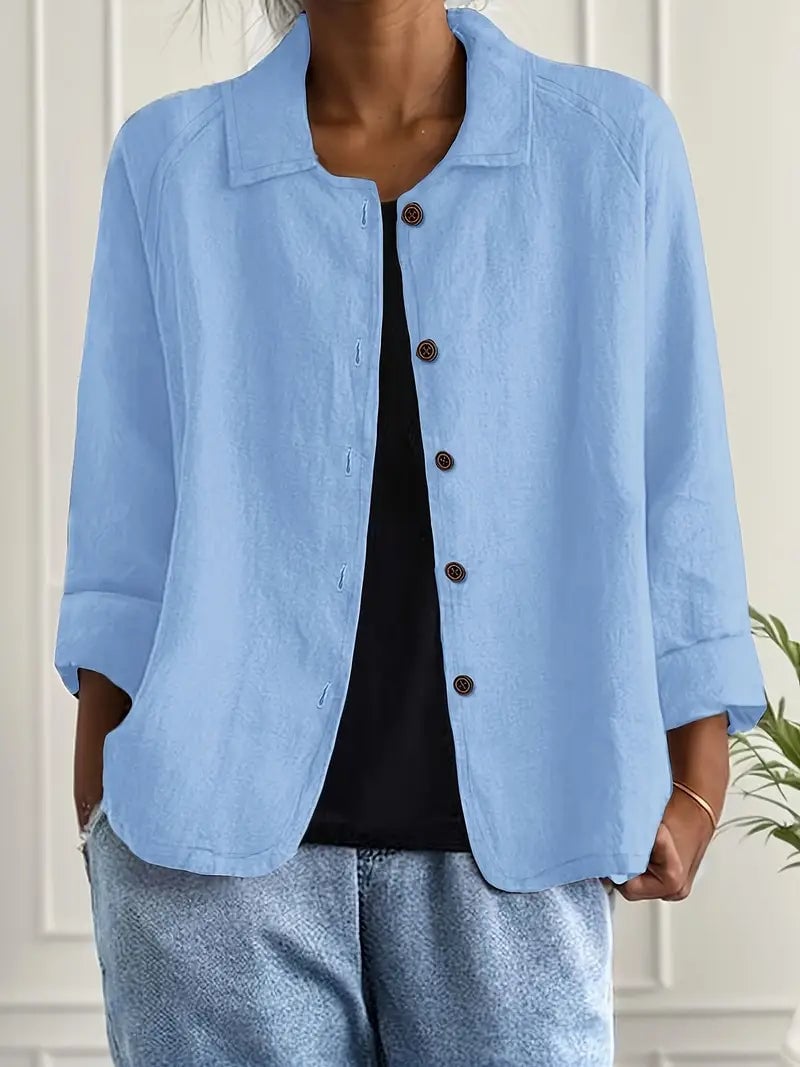 Model wearing a classic lightweight layering top in light blue, styled with casual bottoms