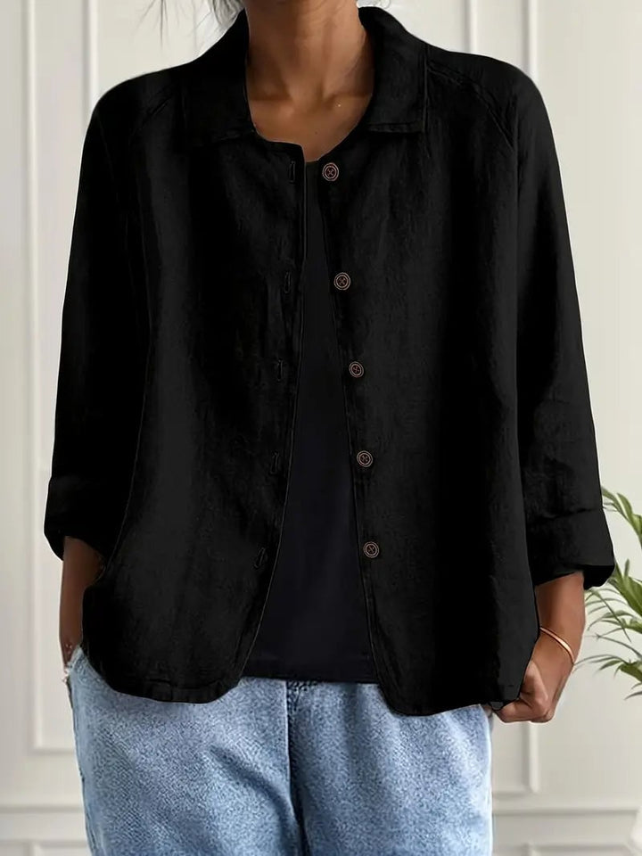 Classic lightweight top in black styled for a simple, polished everyday outfit