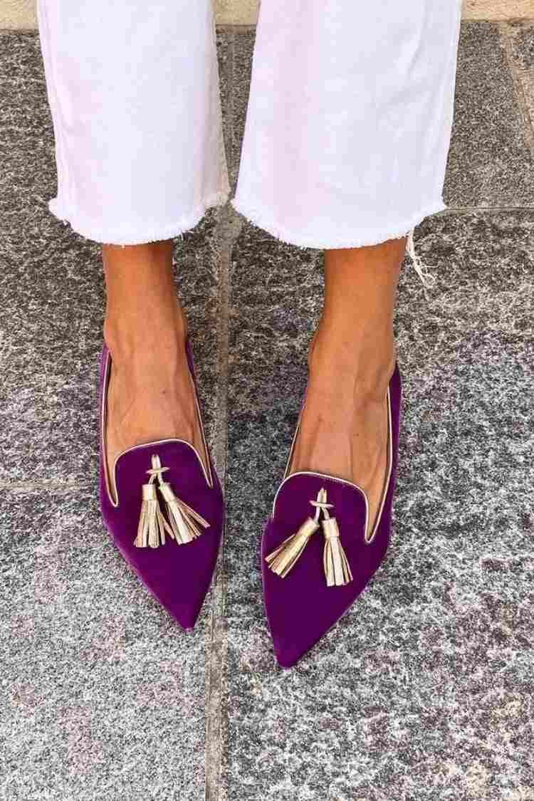 Denise tassel loafers in purple with a smooth polished finish and classic tassel accent, shown from the front