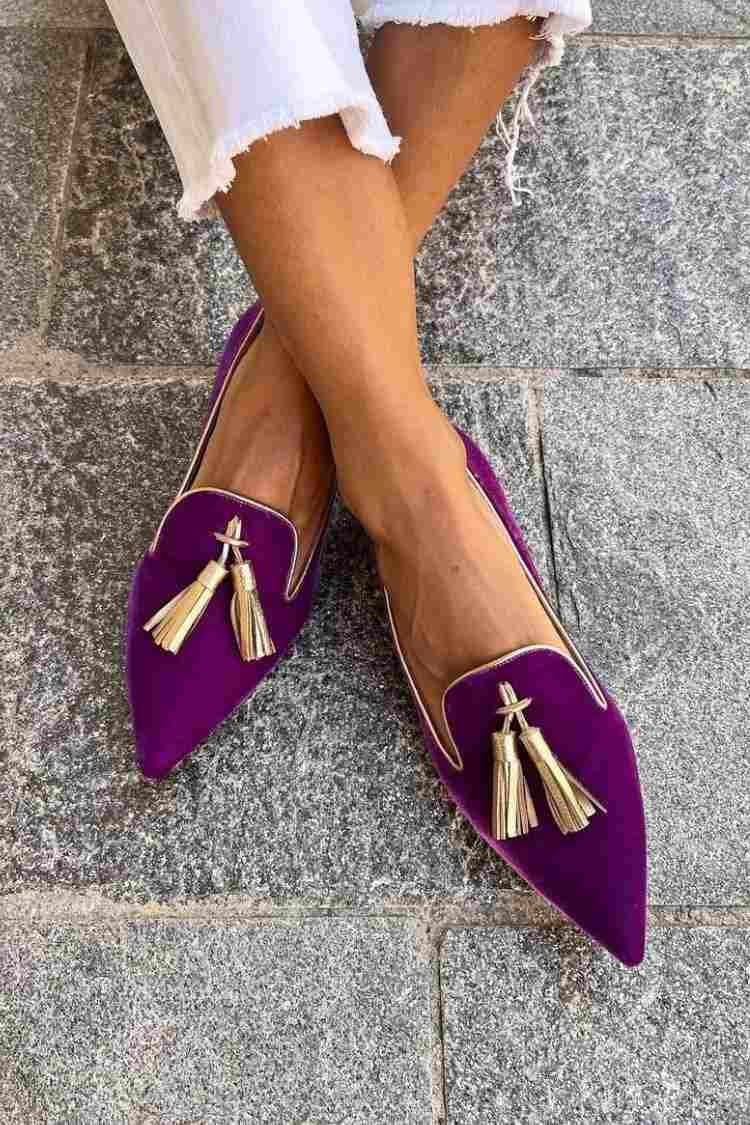 Denise tassel loafers in purple worn on foot, showcasing the elegant silhouette and everyday versatility