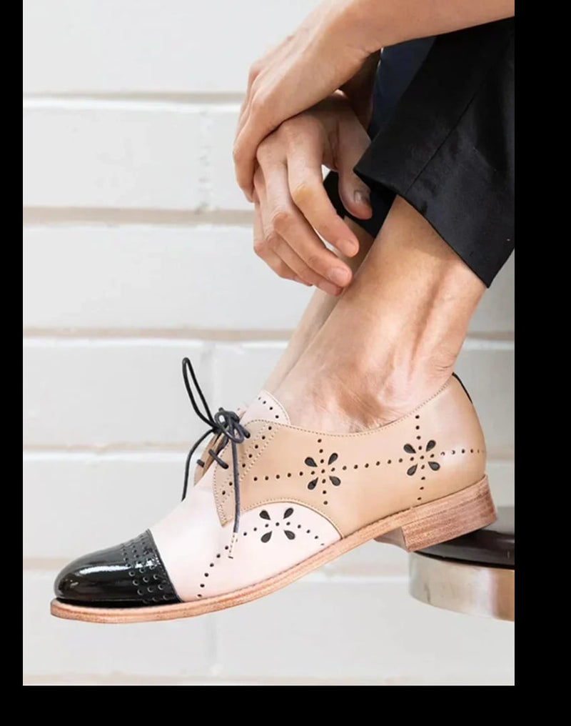 Women's khaki two-tone loafers with a sleek contrasting design, shown from a front three-quarter angle