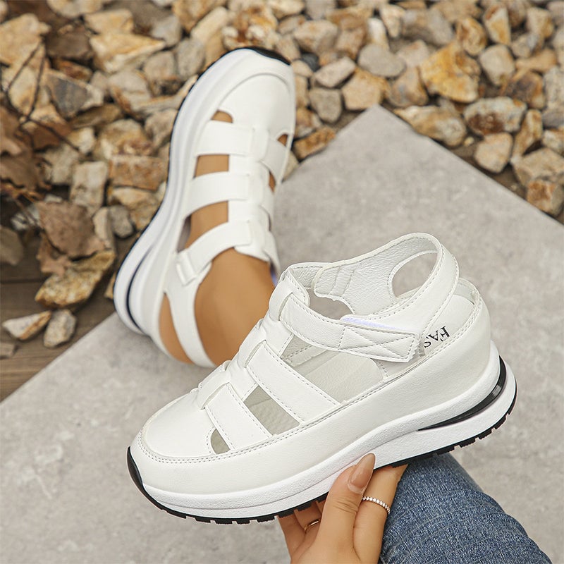 Diane sneakers in white and black colorways displayed side by side on neutral background