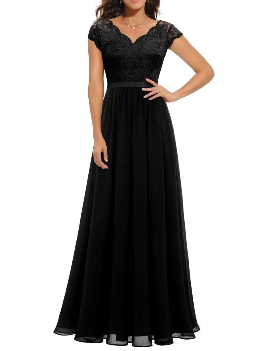 Back view of a women's elegant lace maxi dress in black, highlighting the draped fabric and lace panels