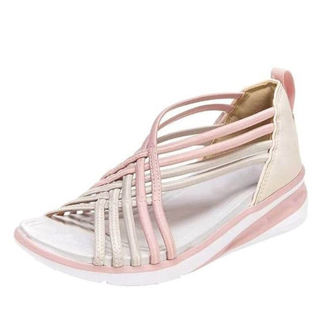 Orthopedic spring sandals displayed flat lay, showing flexible strap design and supportive structure
