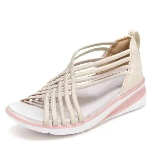 Pair of orthopedic sandals in pink colorway on a clean white background, top-down view