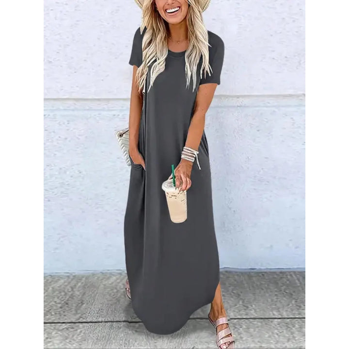 Woman wearing a relaxed casual round neck maxi dress in a solid color, full-length front view