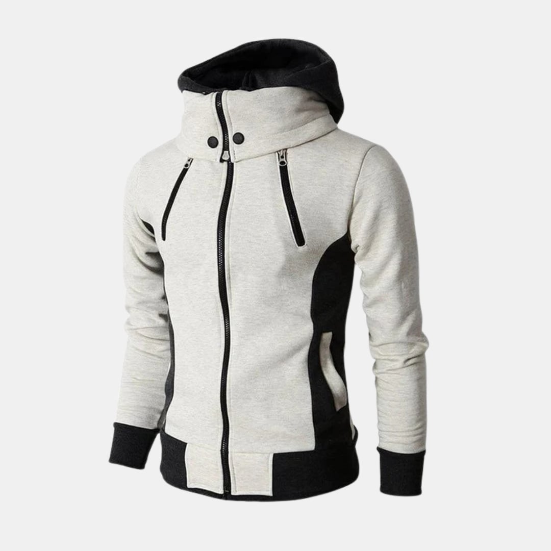 Woman wearing the Dorian Sport Jacket in white, featuring a high-neck hood and contrast details, styled for an athletic look