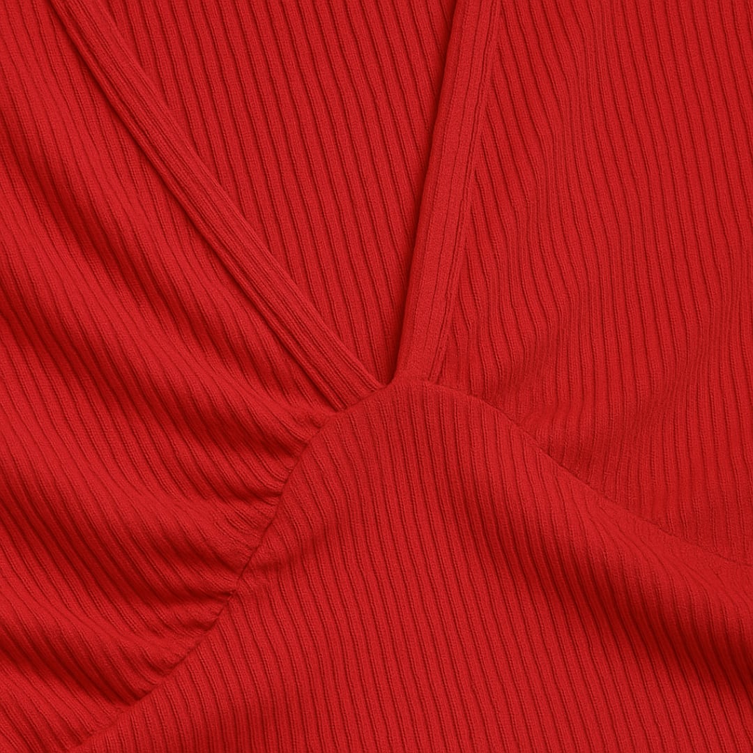 Flat lay of a sleeveless wide-leg jumpsuit in multiple color options including red, black, and navy