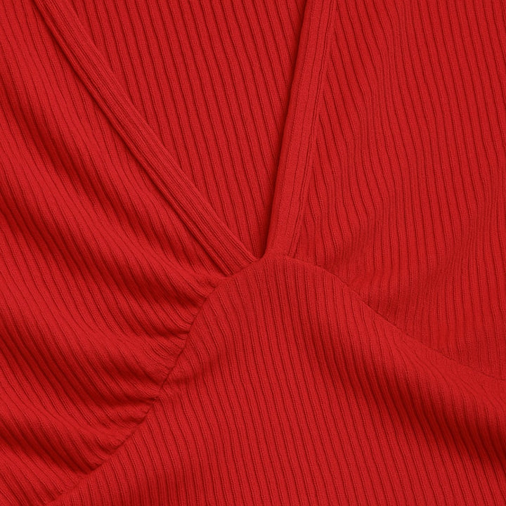 Flat lay of a sleeveless wide-leg jumpsuit in multiple color options including red, black, and navy