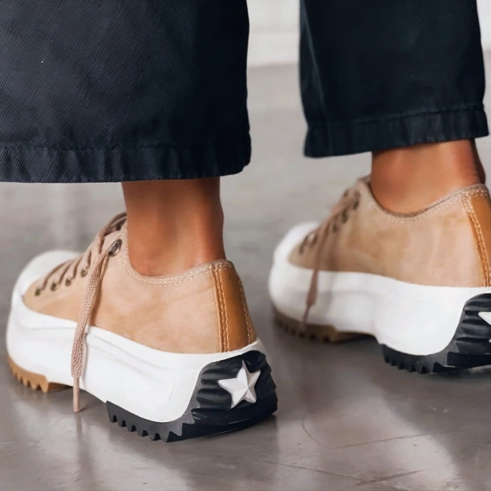 Dorothy women's sneakers in Alpine White displayed on a neutral background