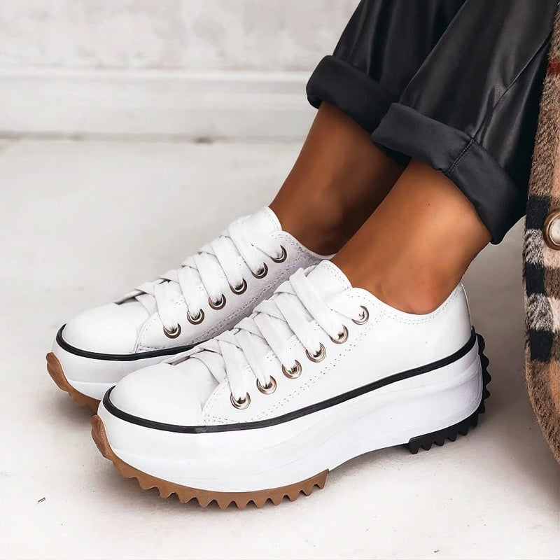 Close-up of Dorothy sneaker sole highlighting shock-absorbing cushioning and metatarsal support