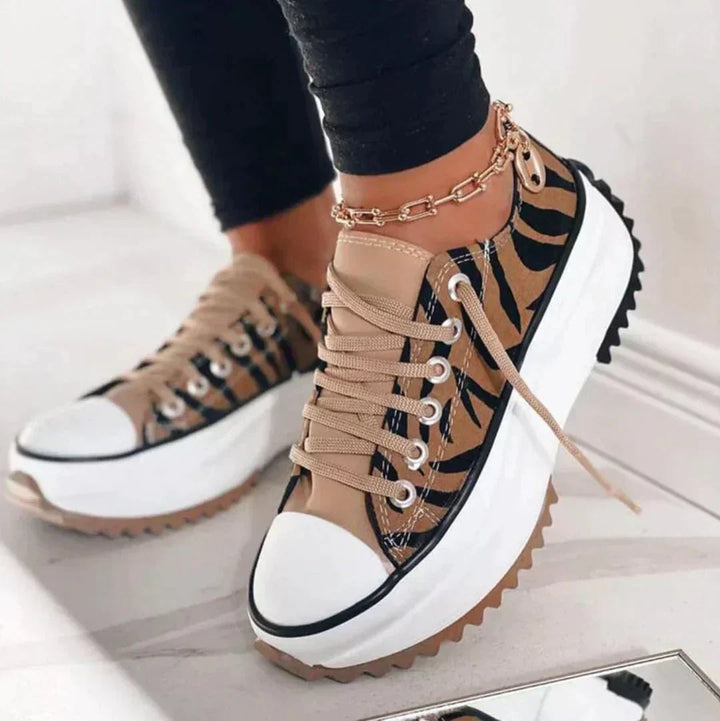 Dorothy women's sneakers in Tiger print, styled with casual everyday outfit
