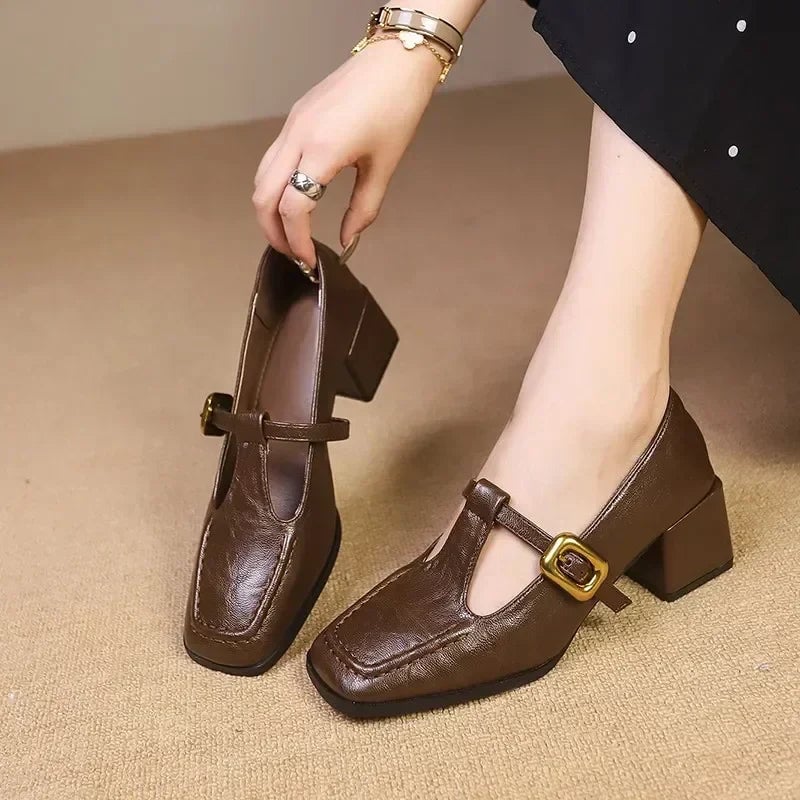 Odette square toe mary jane heels in brown with gold buckle strap and croc-embossed upper, side view