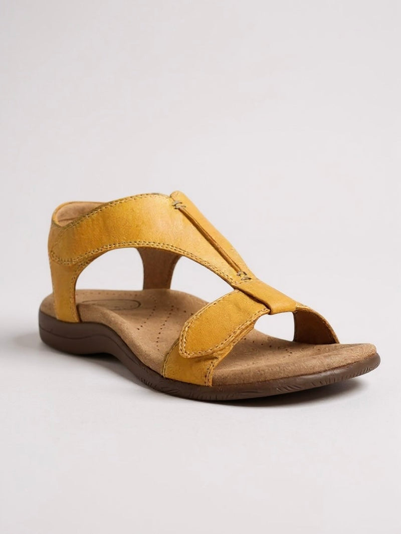 Pair of Dove women's T-strap sandals displayed from above showing the full silhouette