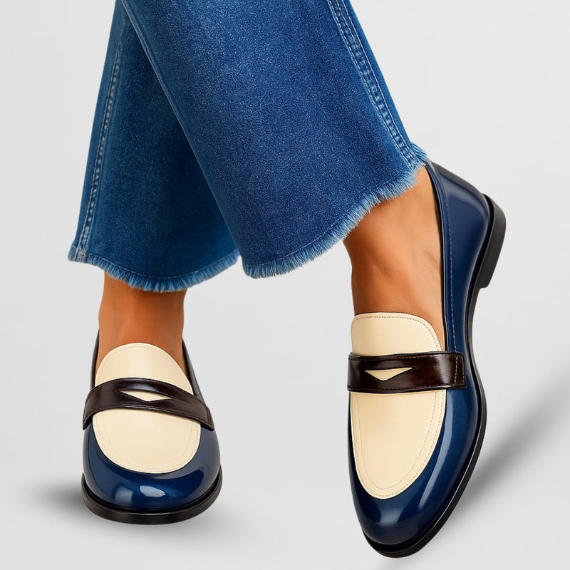 Dulcie chic loafers in white with a sleek silhouette and soft supportive construction, shown from a front angle