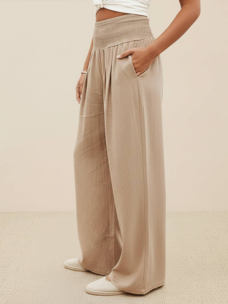 Side view of khaki wide leg linen-look pants showing full-length flowing silhouette