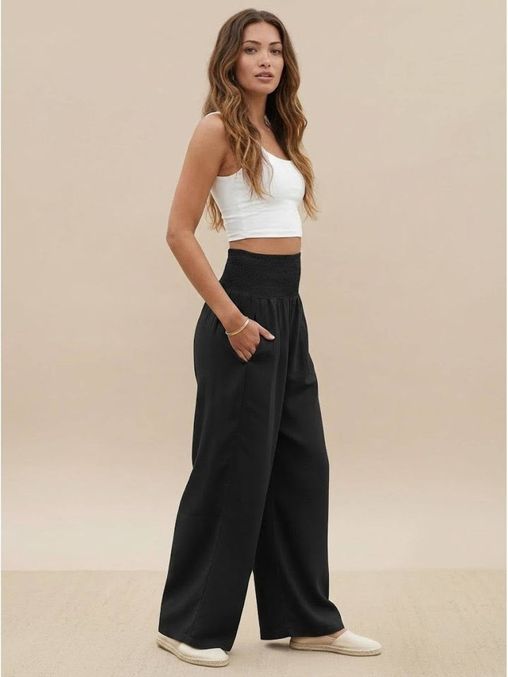 Flat lay of all four colorways of wide leg smocked pants side by side