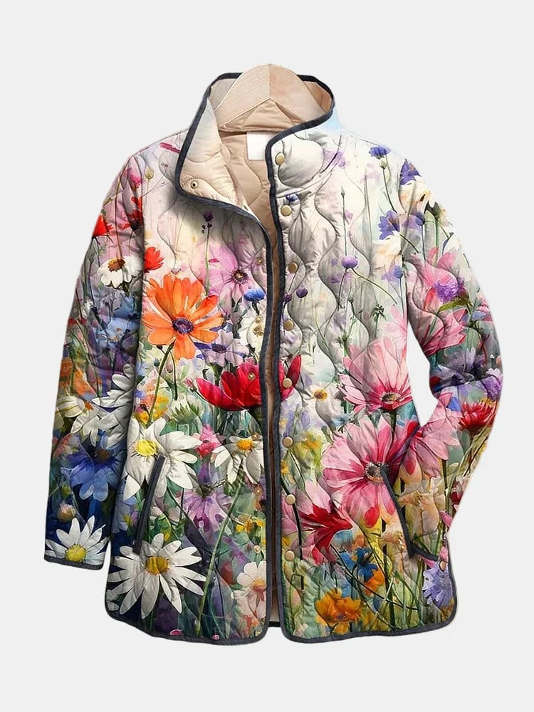Woman wearing a multicolor vintage floral print quilted jacket with a relaxed, flattering fit