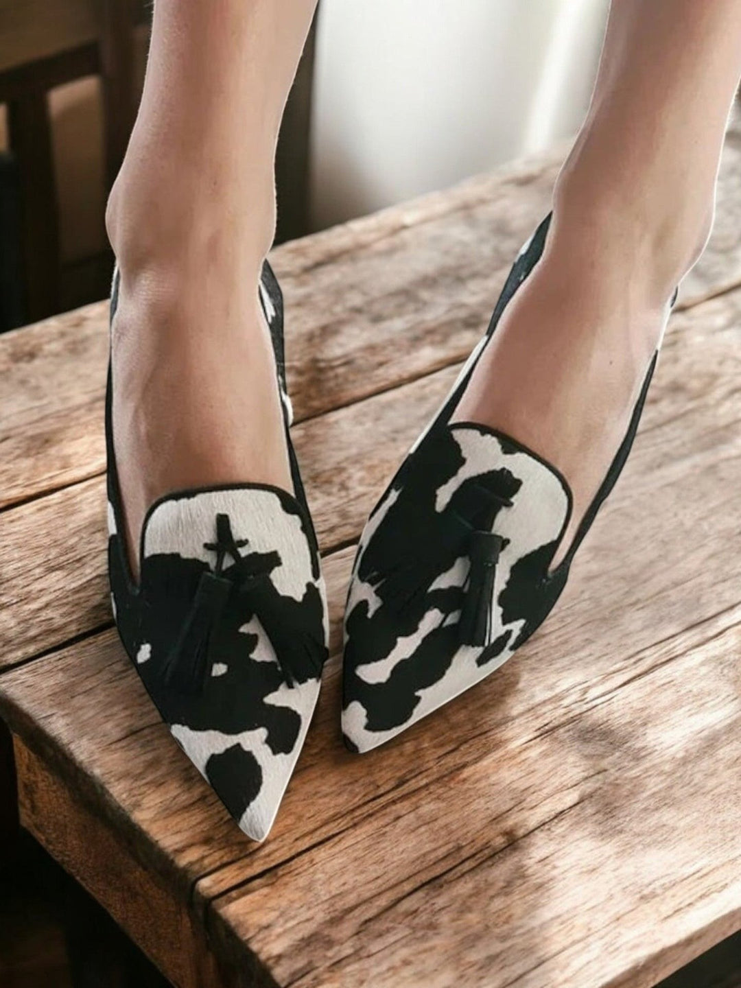 Eden loafers styled with tailored trousers, showcasing their versatile everyday appeal