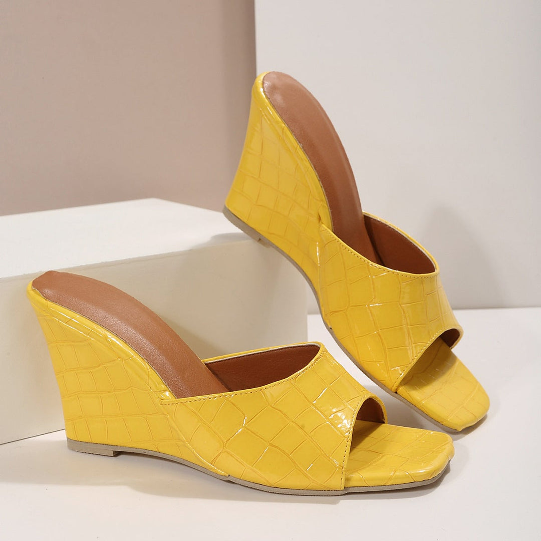 Eden wedge shoe in yellow on a clean white background