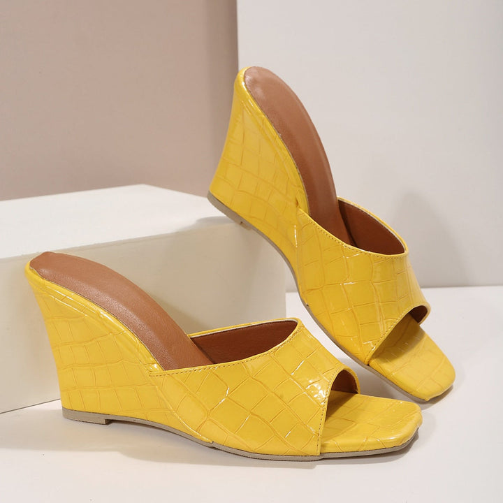 Eden wedge shoe in yellow on a clean white background