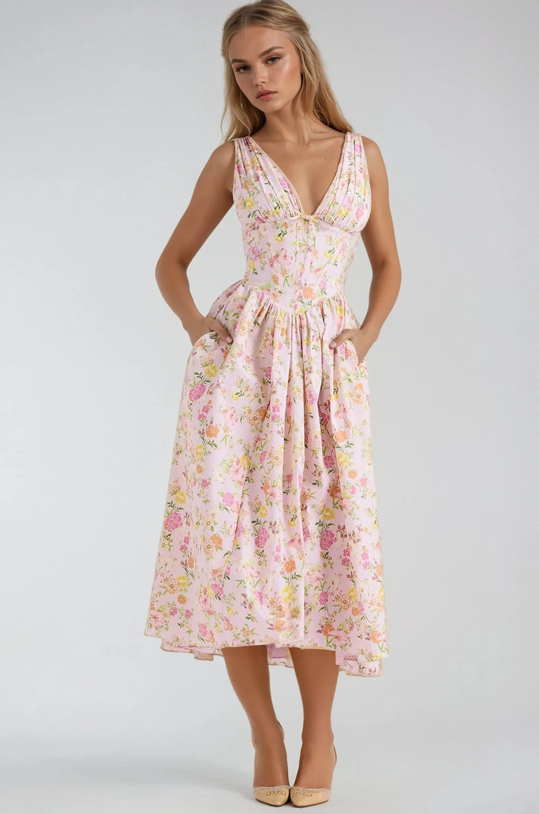 Close-up of the Edith summer dress in pink floral, highlighting the lightweight fabric and feminine details