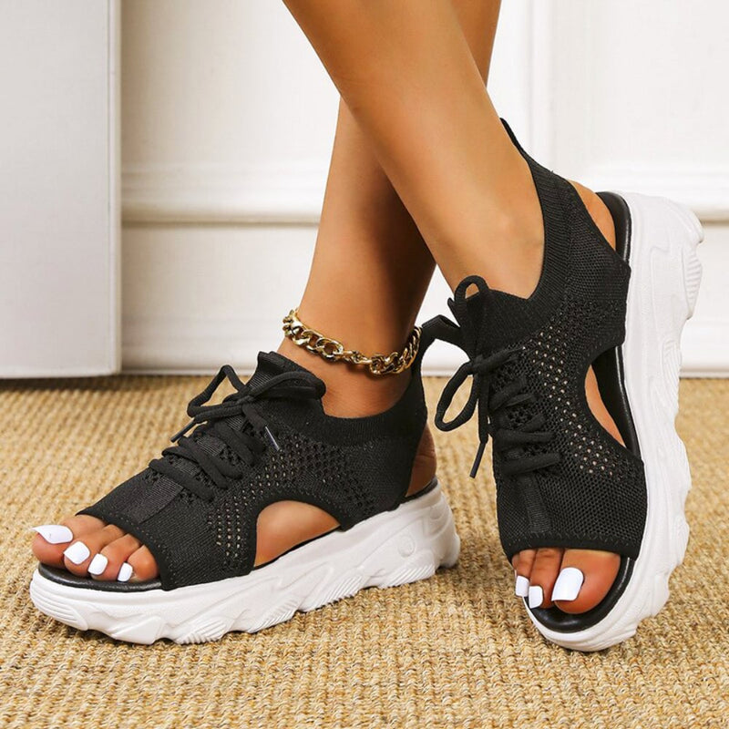 Side view of Effie orthopedic sandals in beige showing cushioned sole and strap detail