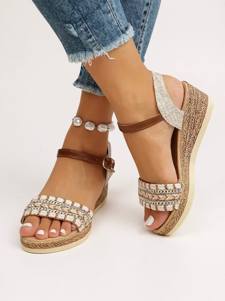Effie beige woven wedge sandals with braided straps and cushioned footbed, front angle view