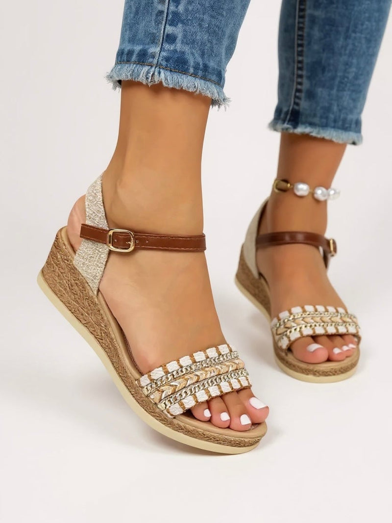 Side profile of Effie women's cushioned wedge sandals in beige highlighting wedge heel height