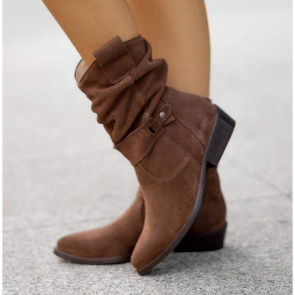 Eileen ankle boots in Suede Beige displayed at a three-quarter angle highlighting the elongating silhouette
