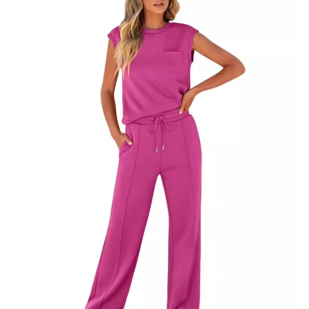 Model styling the lounge co-ord top with the matching bottoms in a breezy outdoor setting
