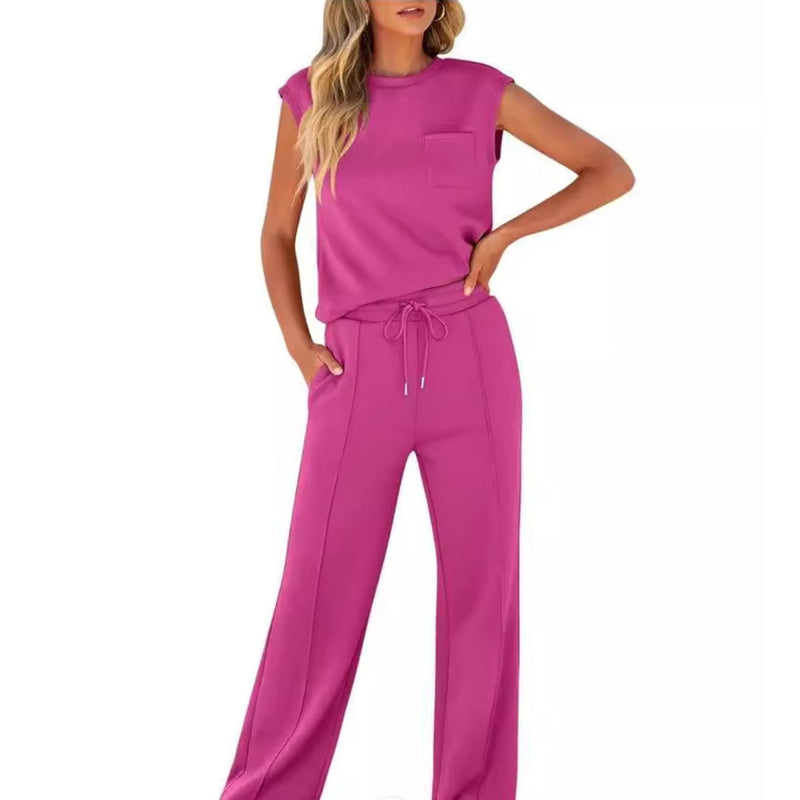 Model styling the lounge co-ord top with the matching bottoms in a breezy outdoor setting