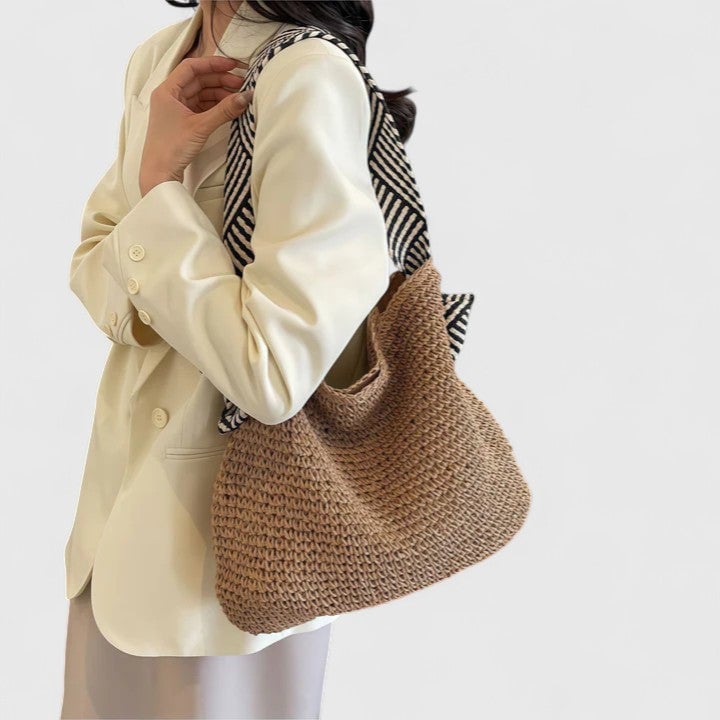 Close-up of braided texture and patterned strap detail on bohemian shoulder bag