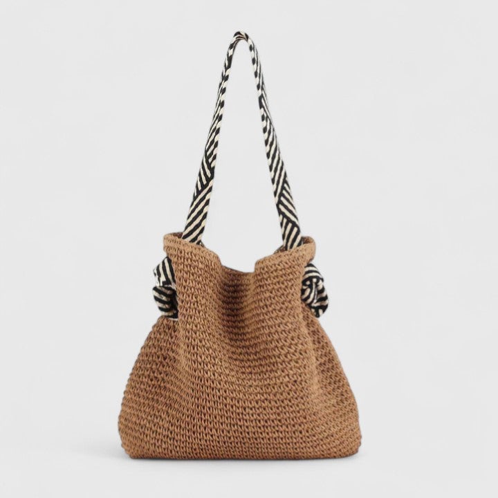 Side view of bohemian shoulder bag showing depth and woven construction